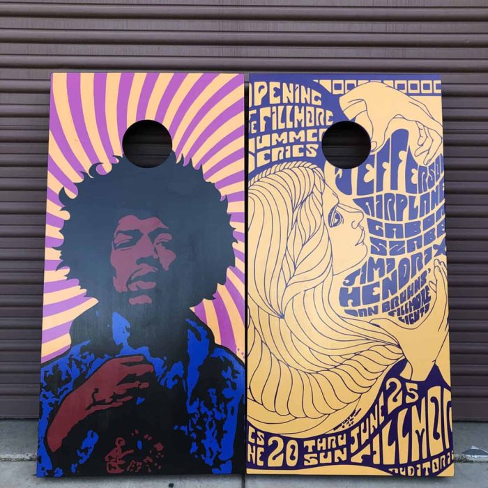 Hendrix and The Fillmore cornhole board with garage background
