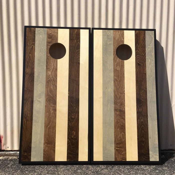 Stain Stripes cornhole board in ambient lighting